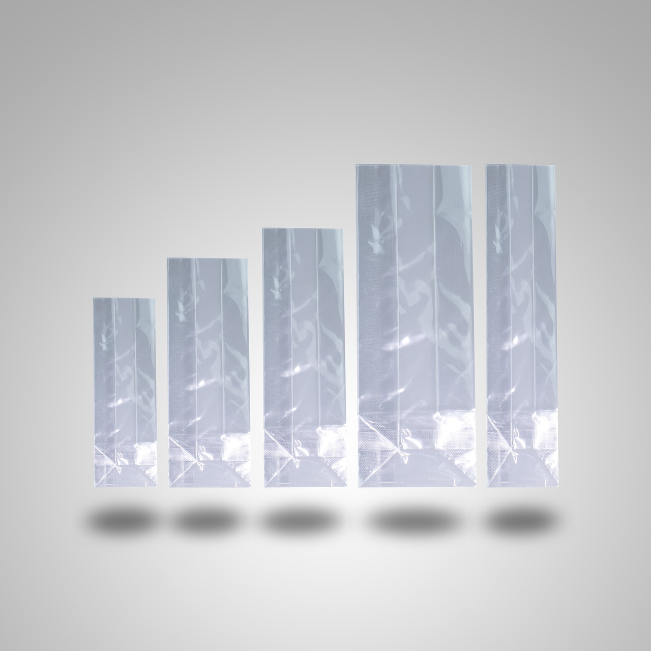 Transparent plastic bags of various sizes stacked together