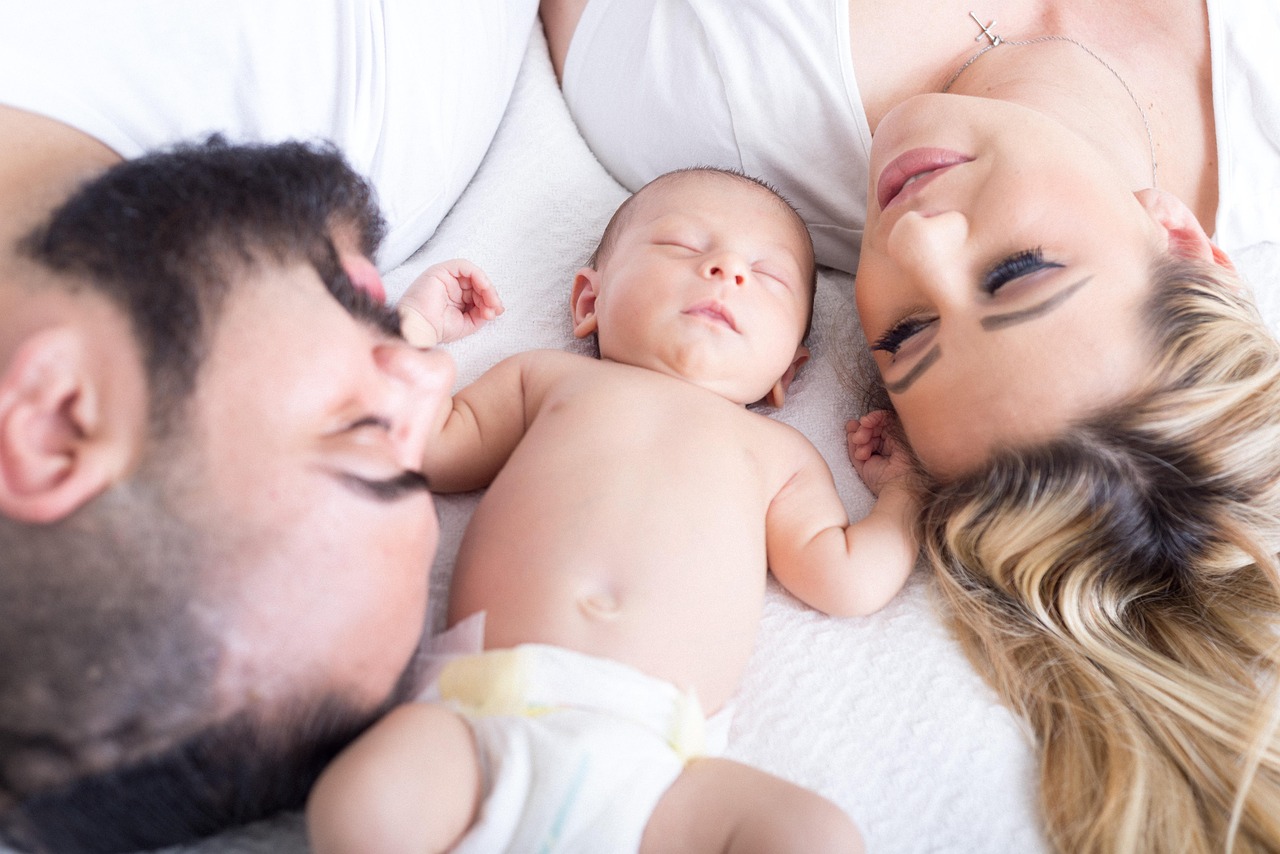 Happy family with newborn in luxurious cabin