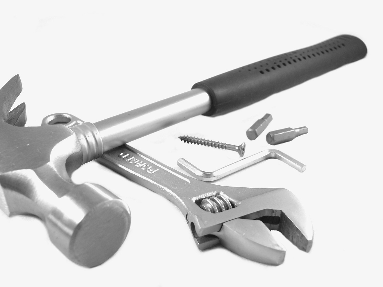 Close-up of assorted construction tools on a workbench